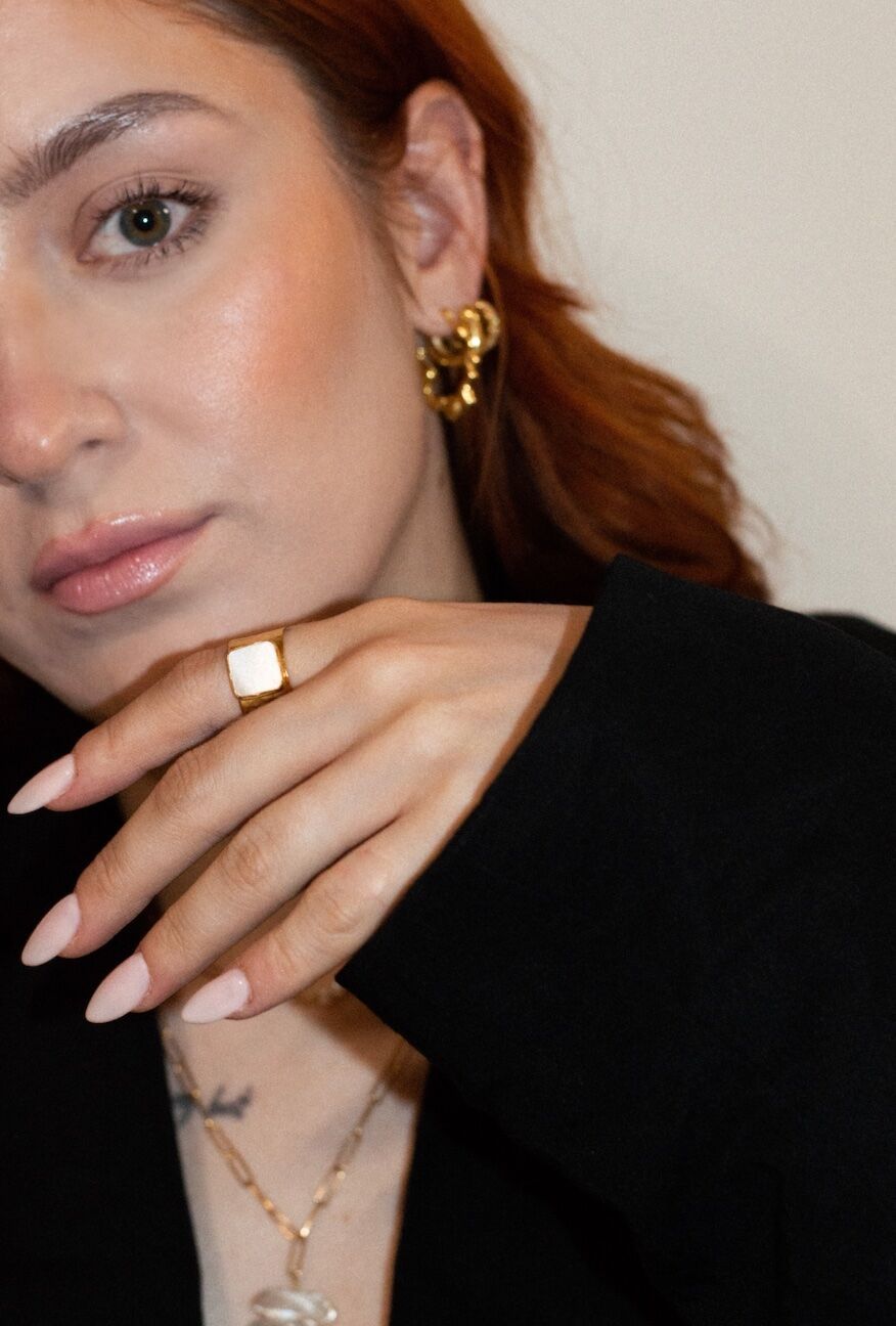 Mother-of-pearl signet ring and gold hoops