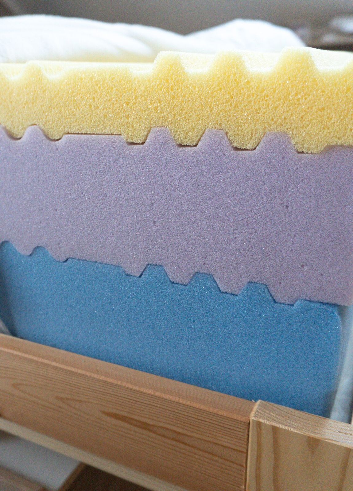 Layered foam construction — yellow, lavender and blue