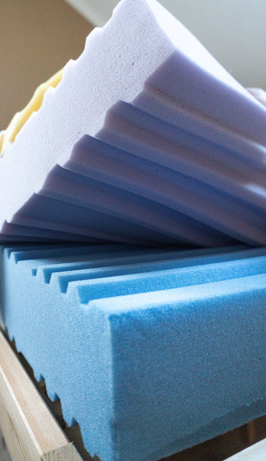 Three foam layers angled on bedframe