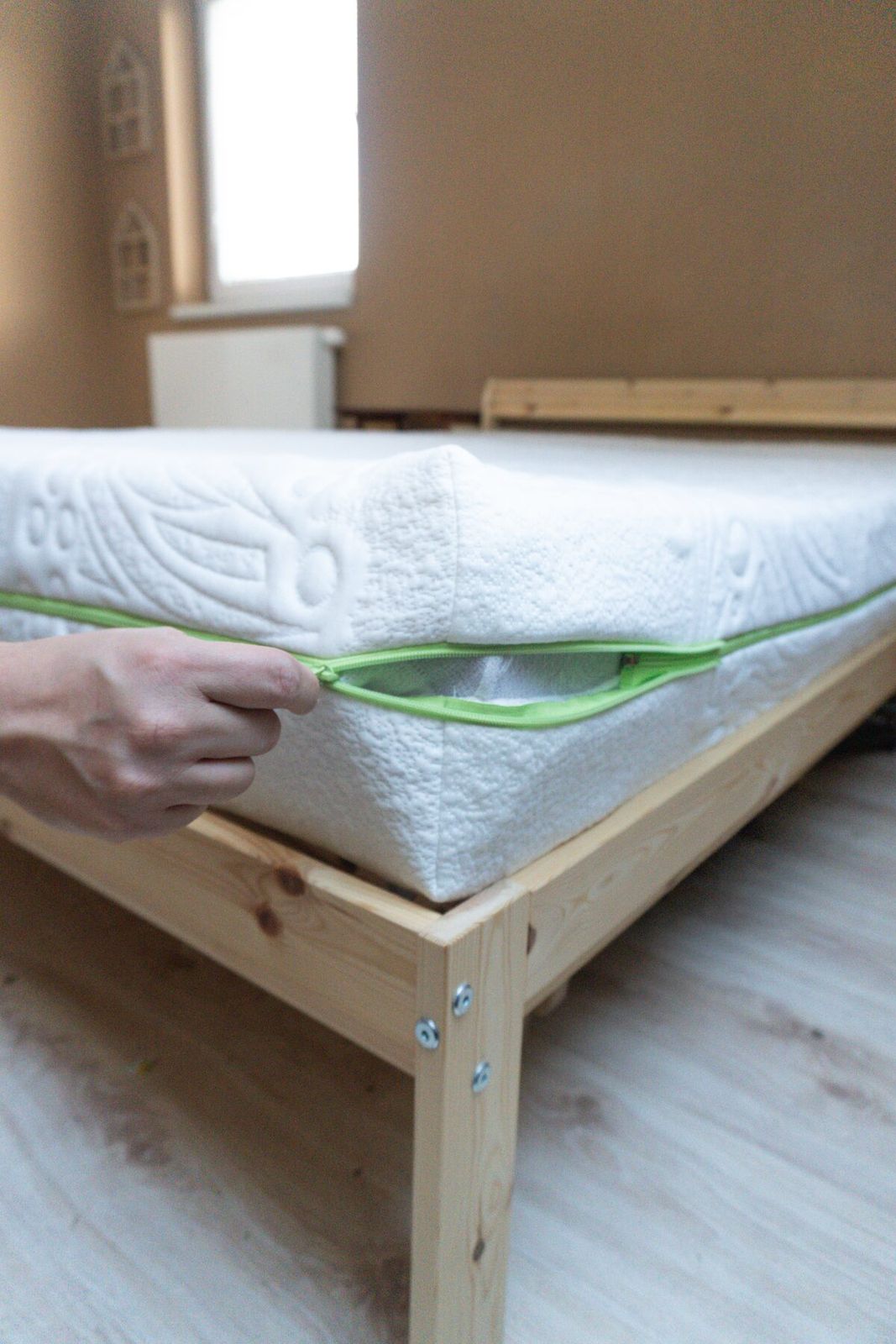 Mattress corner zipper detail in bedroom setting
