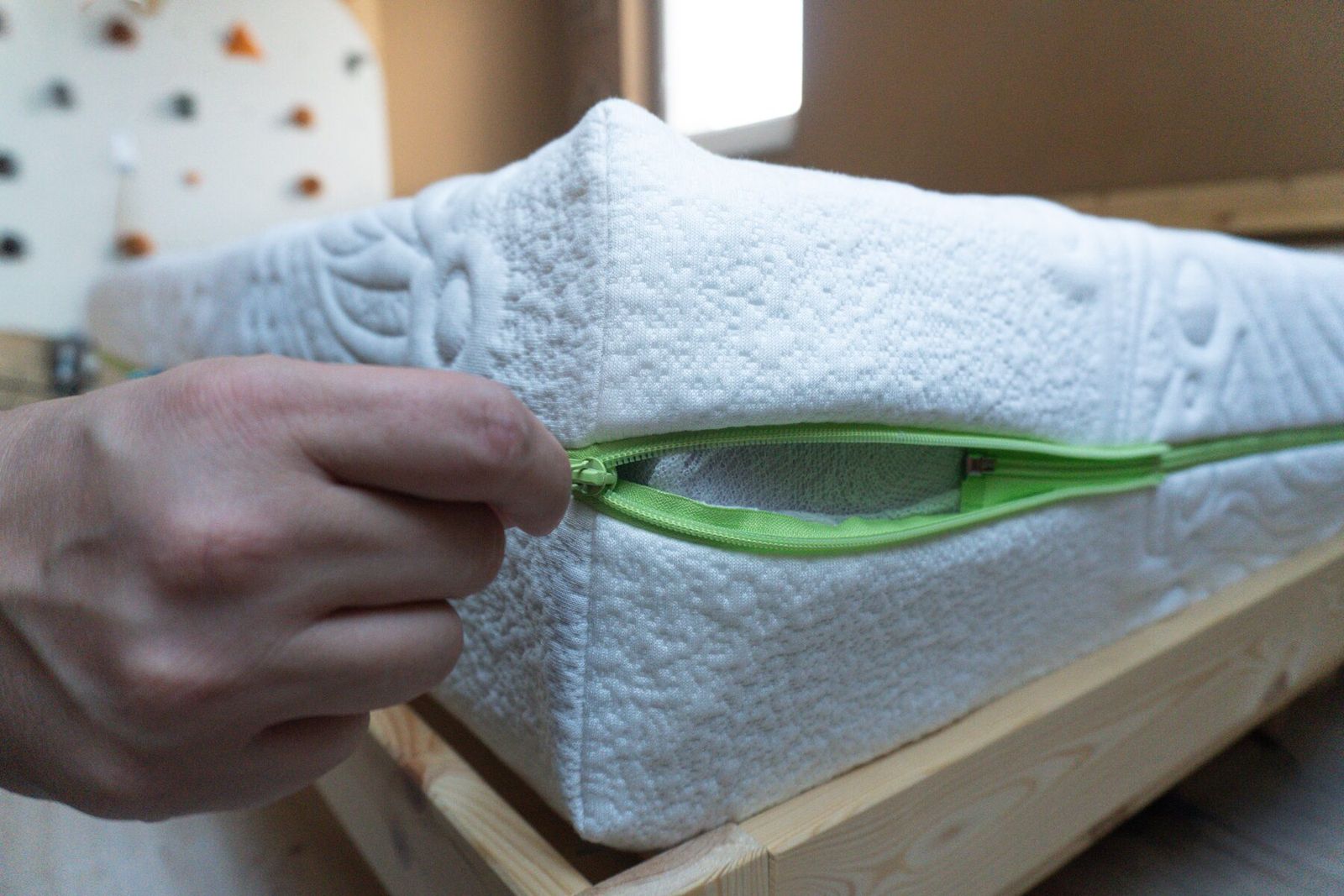 Open zipper showing inner foam through cover